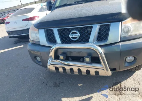 2015 Nissan Titan Pro-4X from USA, damaged, VIN 1N6BA0EC6FN512573